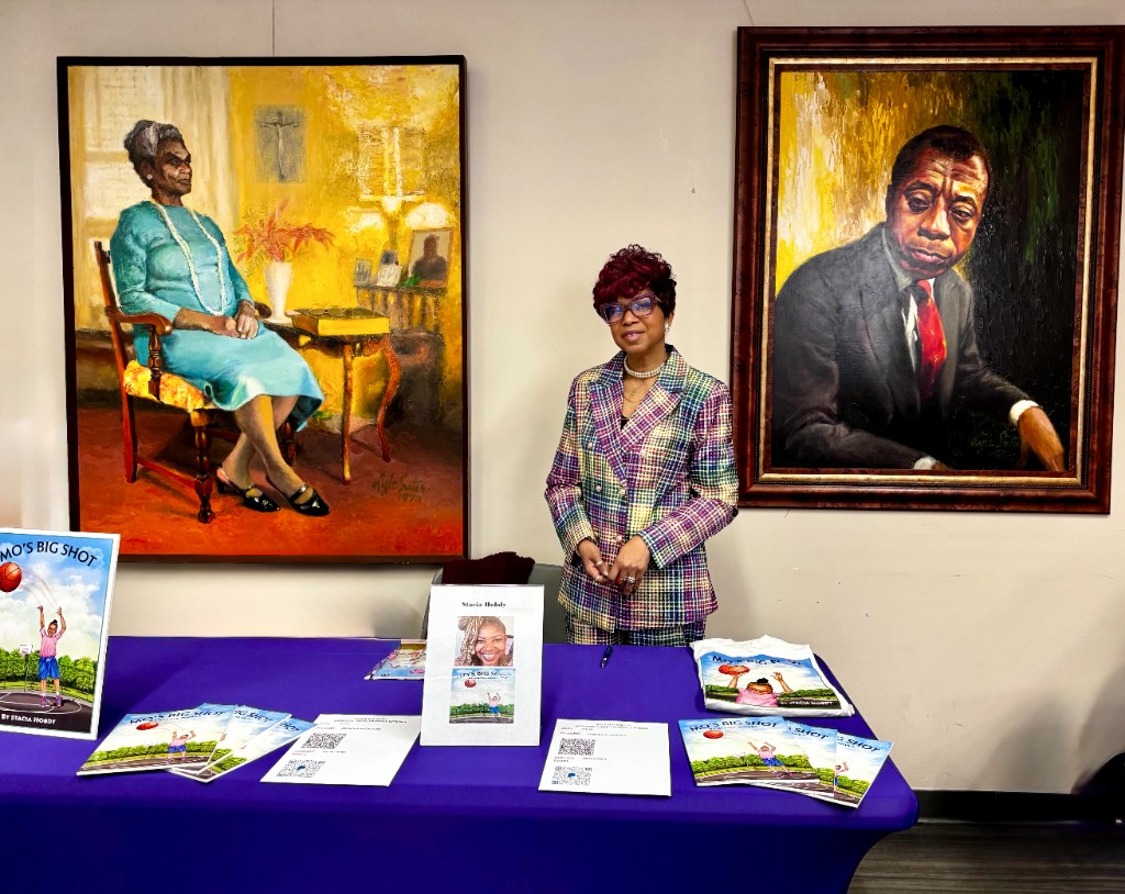 Stacia Hobdy at a Mo's Big Shot book table