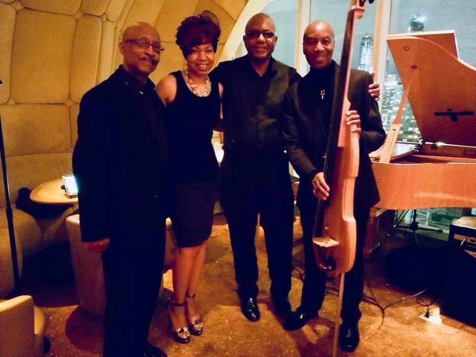 Stacia Hobdy with her live band