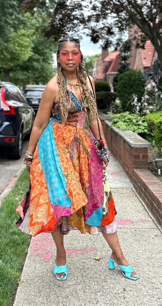 Stacia Hobdy in a colorful patchwork dress