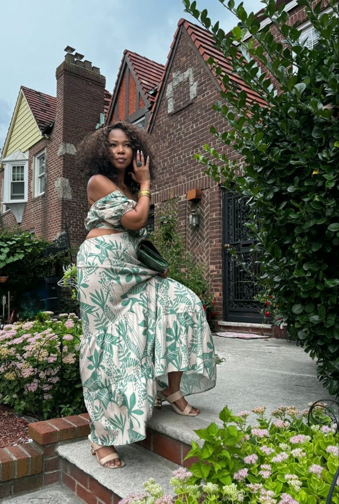 Stacia Hobdy in a green leaf-print two-piece